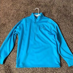Men’s Puma golf pullover.